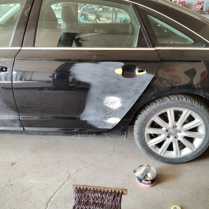 车门是尽量钣金还是换门/4s店为什么不用无腻子修复